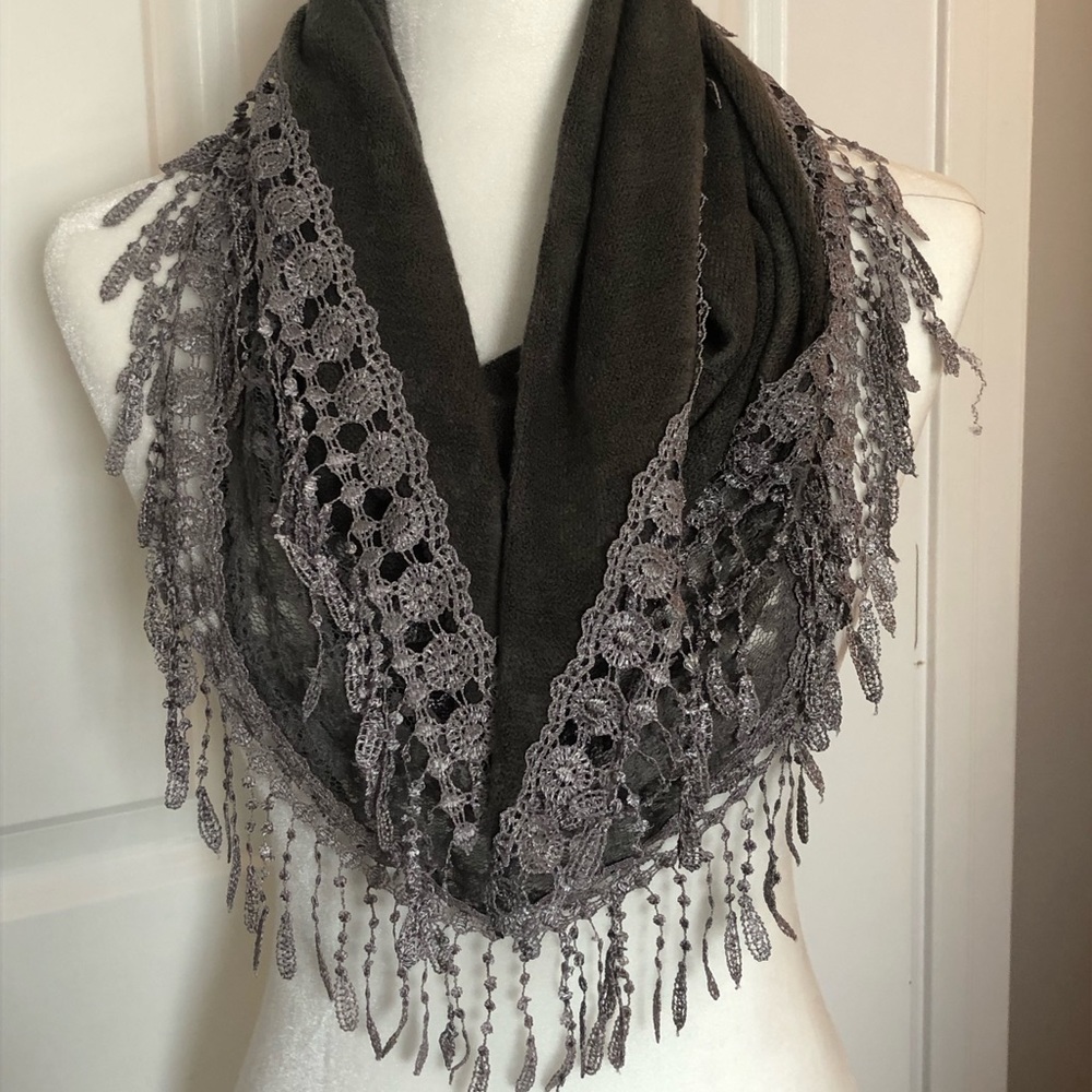 Gray scarf with hand crocheted detail.